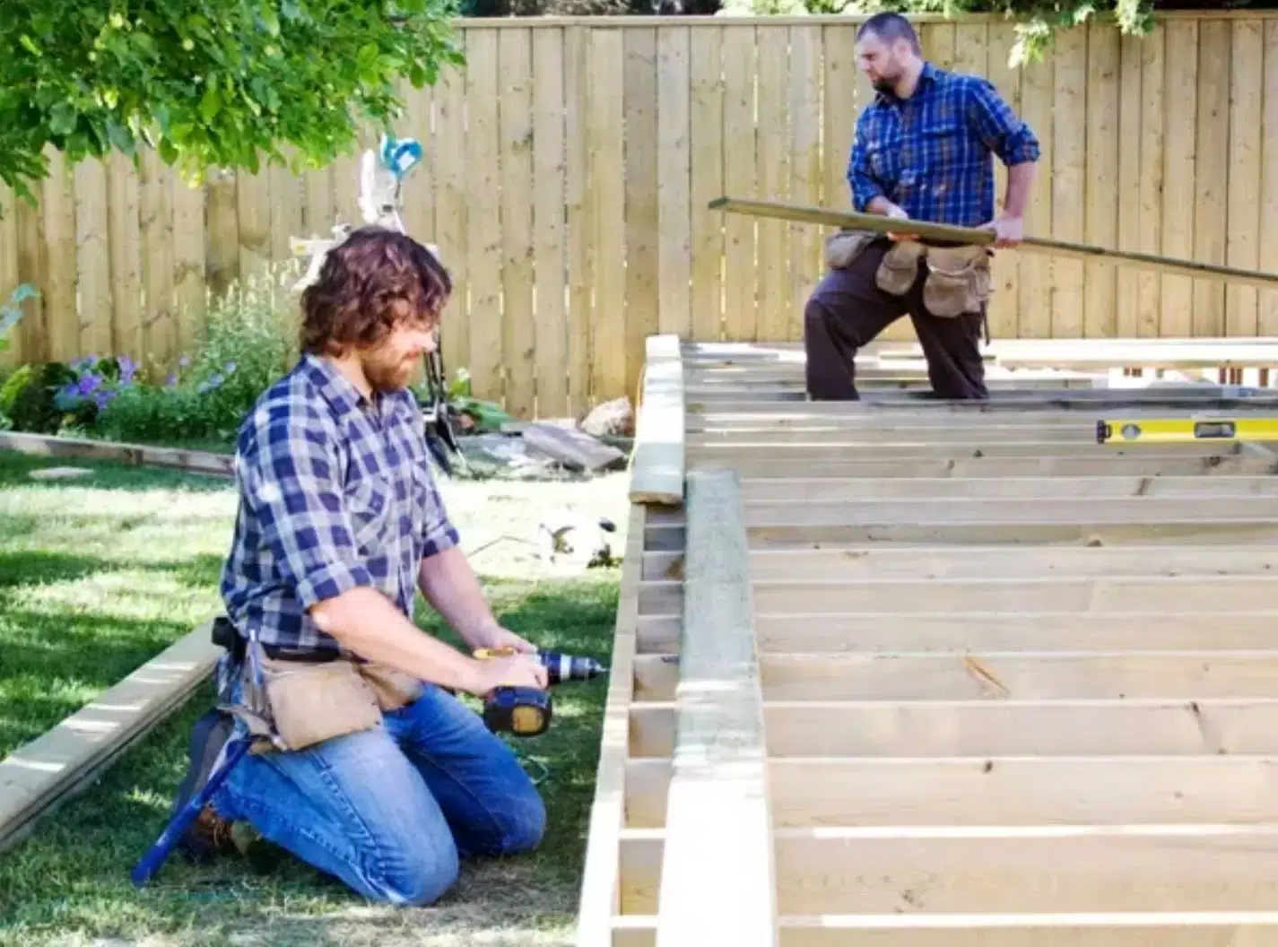 Trenkle Construction crew framing and building a new backyard deck